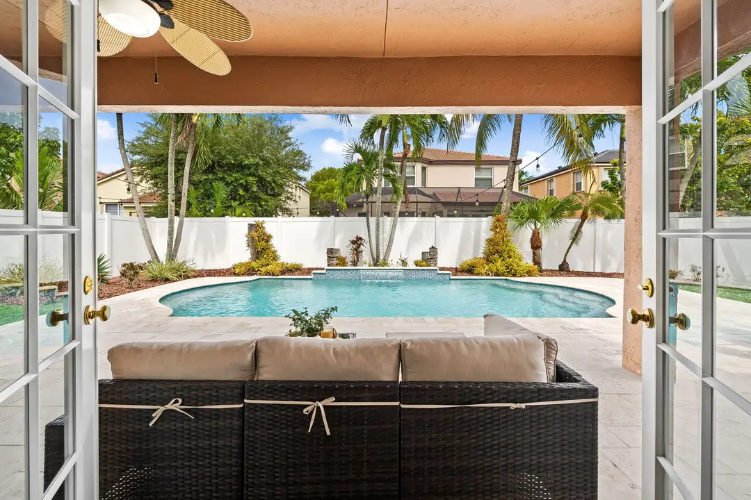 French doors leading to Pool
