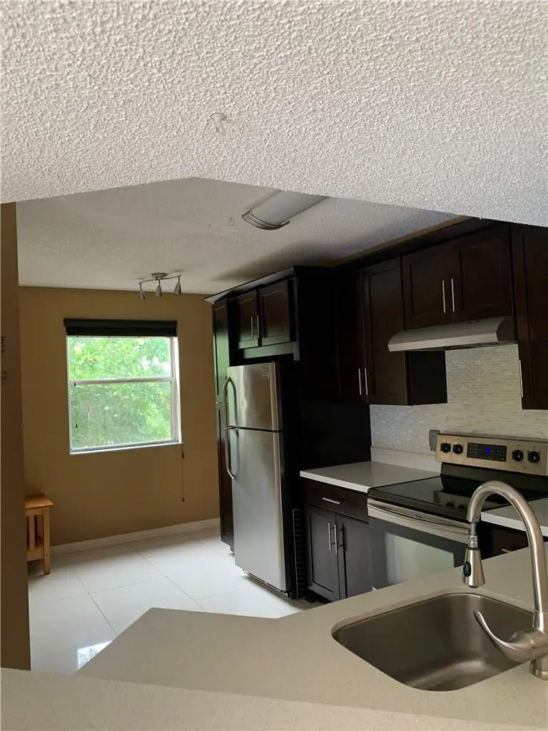 8891 Wiles Road 308, Coral Springs, FL 33067